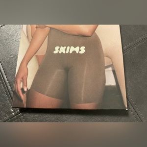 SKIMS sculpting mid thigh shorts